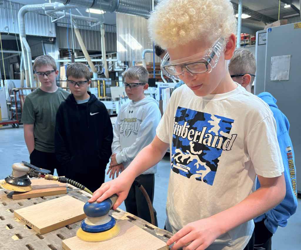 Student exploring a career in wood manufacturing.